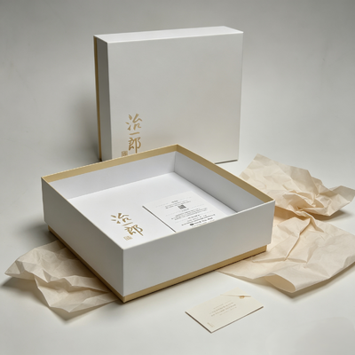 Buen precio Elegantes cajas de embalaje de chocolate de estilo japonés minimalista con laminado mate y ribete interior dorado claro, perfectas para bocadillos horneados en línea