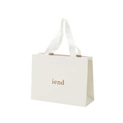 Buen precio Los bolsos impresos lujo de la manija de la cinta texturizaron el LOGOTIPO del oro de los bolsos del regalo de Recyled en línea