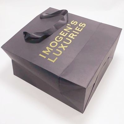 Buen precio La aduana imprimió la manija de seda de las bolsas de papel de Kraft reciclable para el empaquetado del regalo en línea