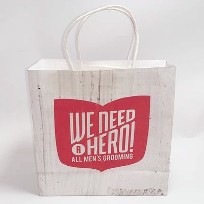 Buen precio El regalo blanco de papel impreso aduana de Kraft del papel de Kraft de los bolsos de ultramarinos empaqueta plegable en línea