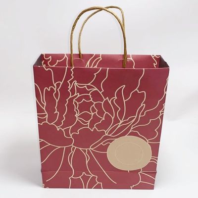 Buen precio Los bolsos de papel de color claro de la mercancía se levantan la bolsa de papel de Kraft Eco amistoso en línea