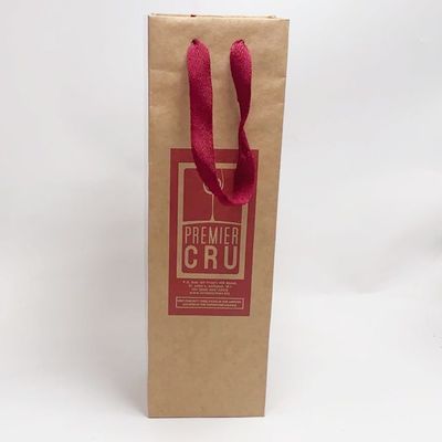 Buen precio El regalo de la botella de vino tinto de la bolsa de papel de Kraft de la manija de la cinta empaqueta el grueso de 0.30m m en línea