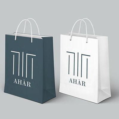 Buen precio el regalo reciclado 250gsm empaqueta las bolsas de papel blancas personalizadas grandes biodegradables en línea