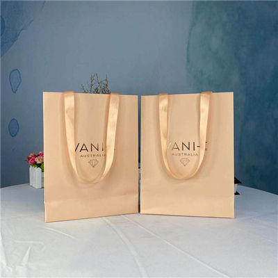 Buen precio Bolsos que hacen compras de papel de encargo de la ventana portátil rosada en línea